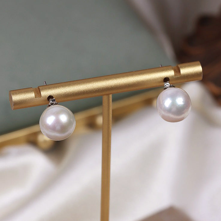 The luster display of 10-11mm Nearly Round Edison Pearl Earrings