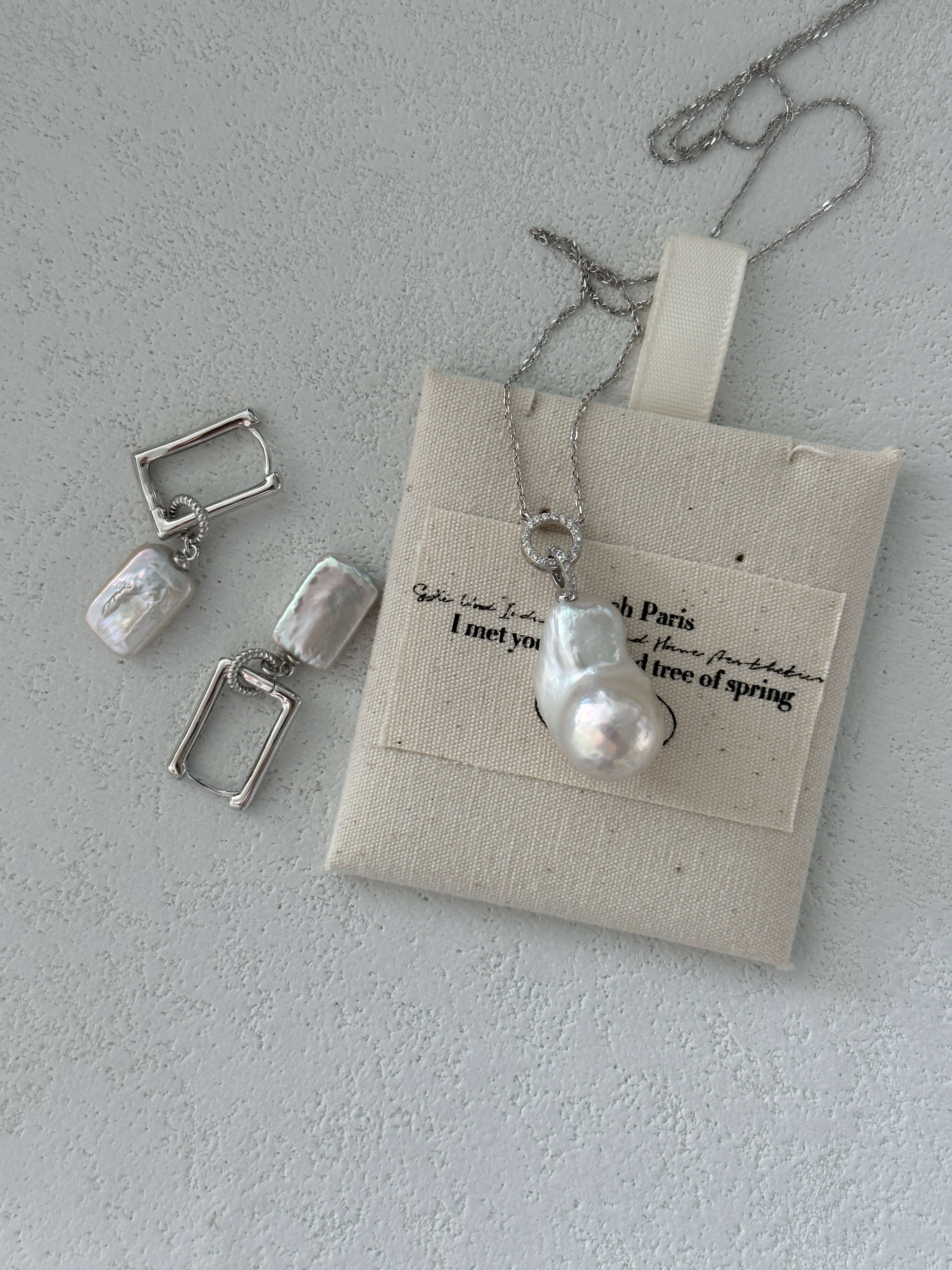 Double-Ring Baroque Pearl Pendant on Silver Chain