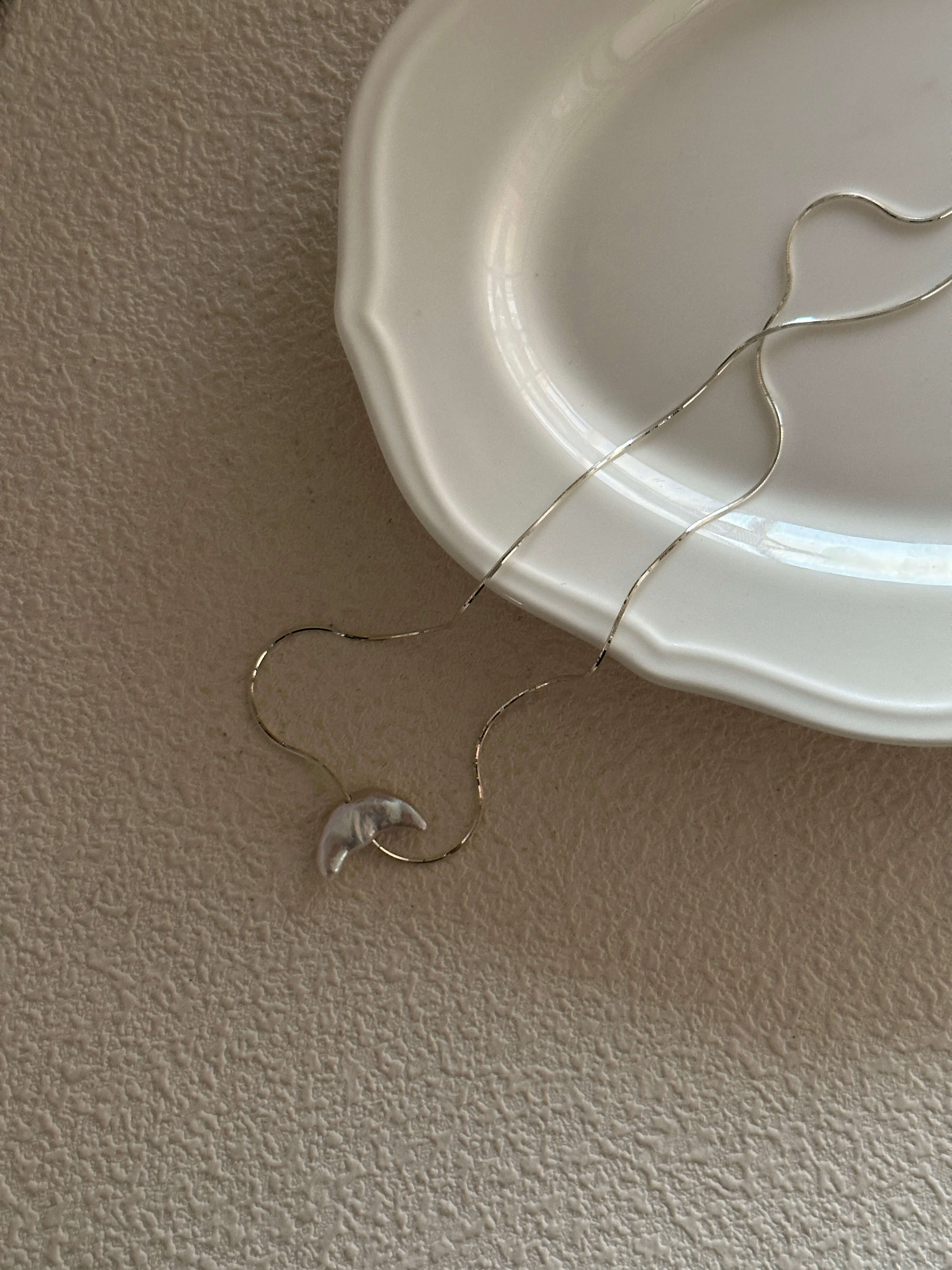 Crescent-Shaped Baroque Pearl Pendant on Silver Chain