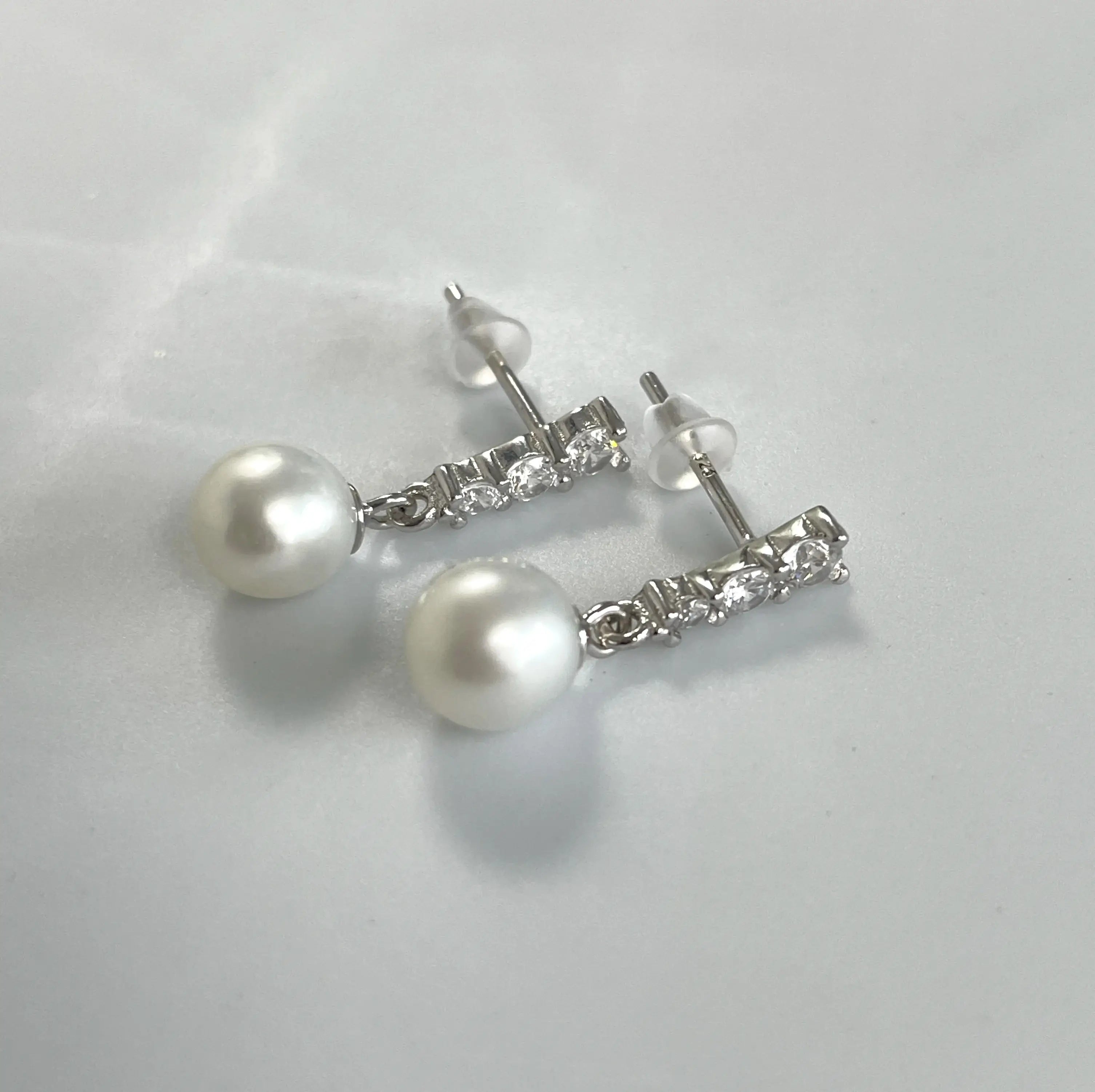 Noble Charm Studs – Pearl and Zircon Earrings