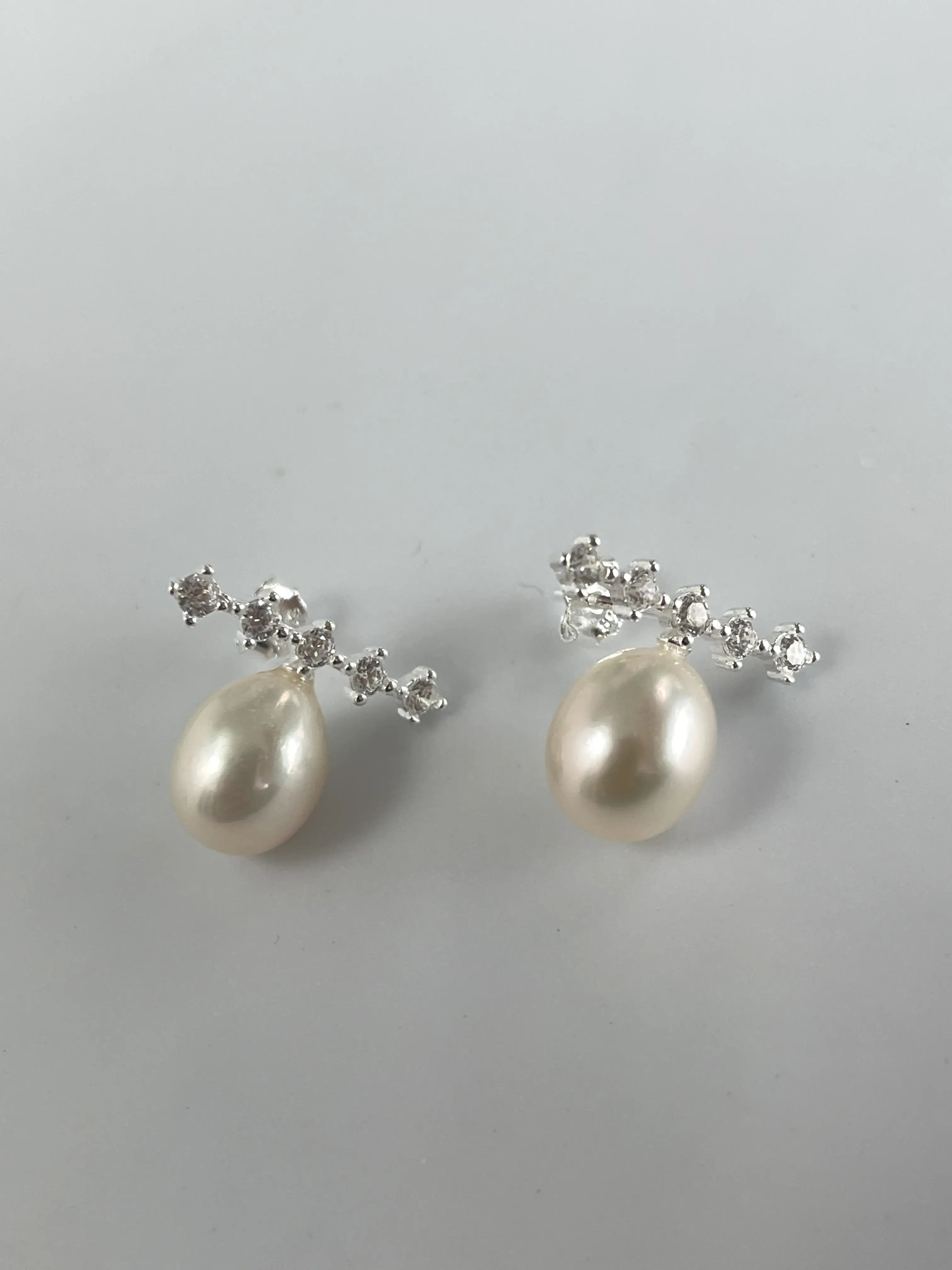 Radiant Line Earrings – Teardrop Pearl Studs