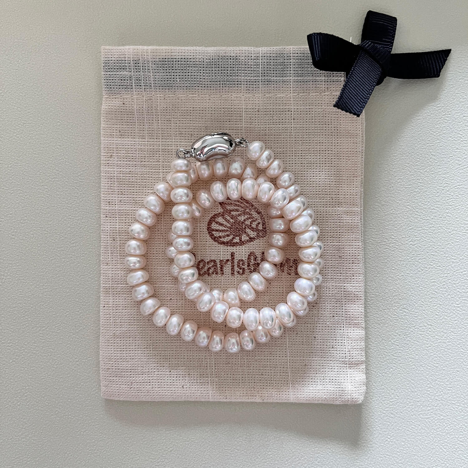 عقد من اللؤلؤ بأزرار 7-8 ملم