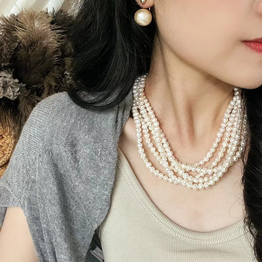 Eternal Grace – Multi-Strand Pearl Necklace