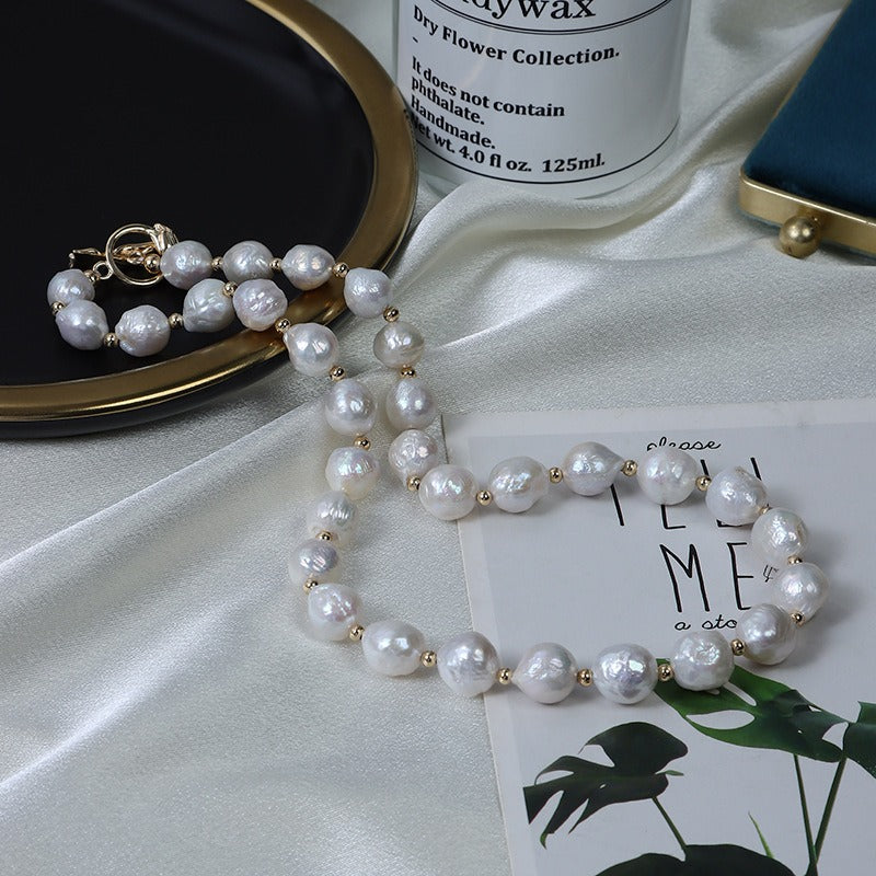 The Luster and Color Display of a 9-10mm Freshwater Baroque Pearls - Toggle Clasp