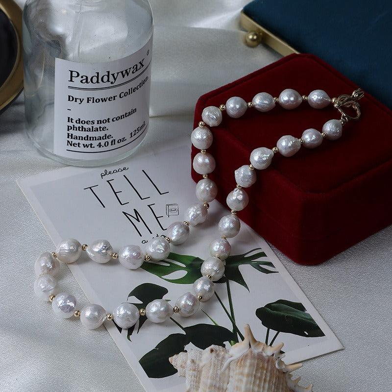 9-10mm Freshwater Baroque Pearls with toggle clasp displays a classic and elegant style.