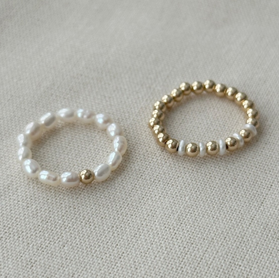 Freshwater Pearl Stretch Ring with goldenball elements in a styled combination showcase.