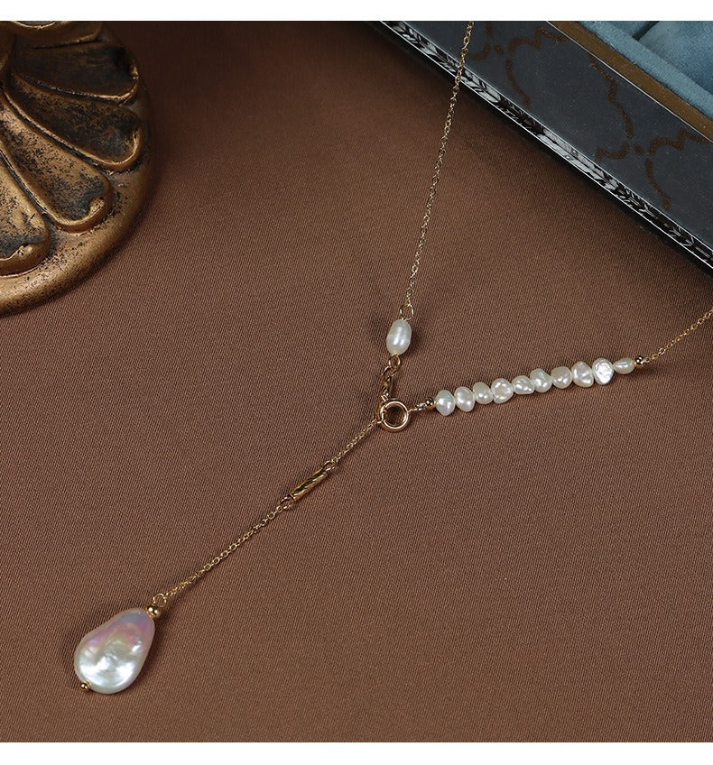Close-up detail showcase of the Long Keshi Pearl Pendant Gold Chain Necklace