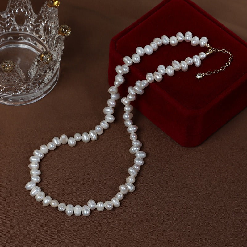 Oval freshwater pearl necklace displays an enchanting luster and elegant demeanor.