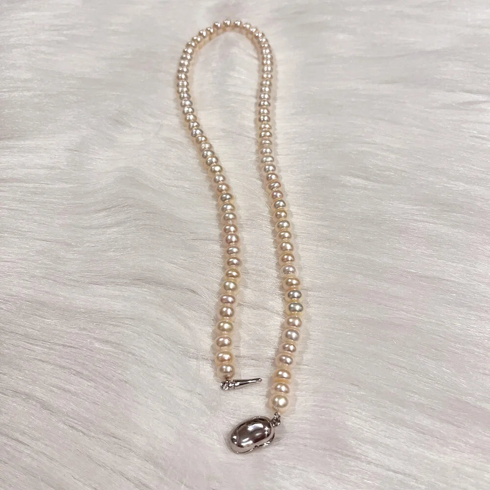 عقد من اللؤلؤ بأزرار 7-8 ملم