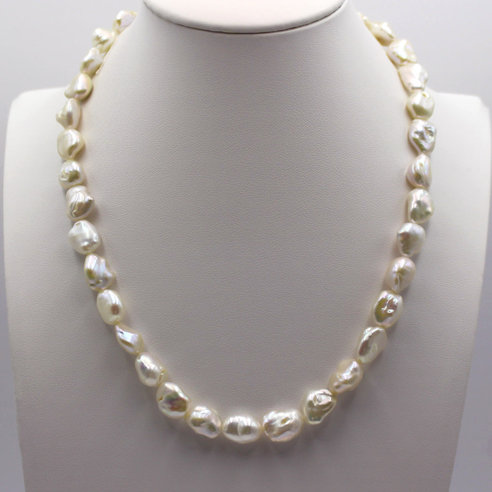10-11mm Freshwater Baroque Pearl Necklace displayed on a white leather mannequin stand