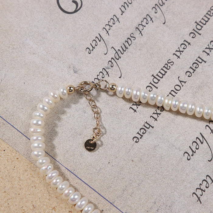 Close-up detail of the clasp of 4-5mm button pearl necklace