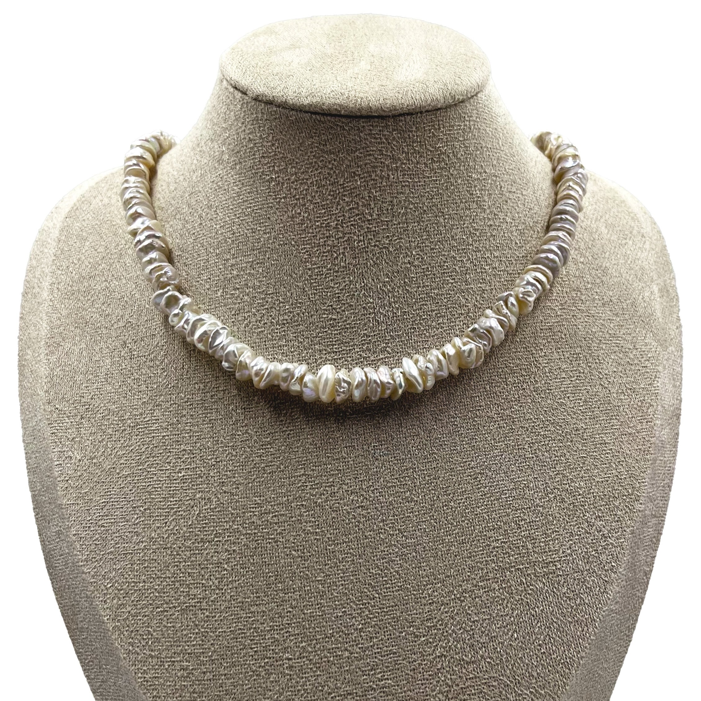 5-6mm Coin-shaped Stacked Hole Keshi Pearl Necklace showcasing an elegant and distinctive style.