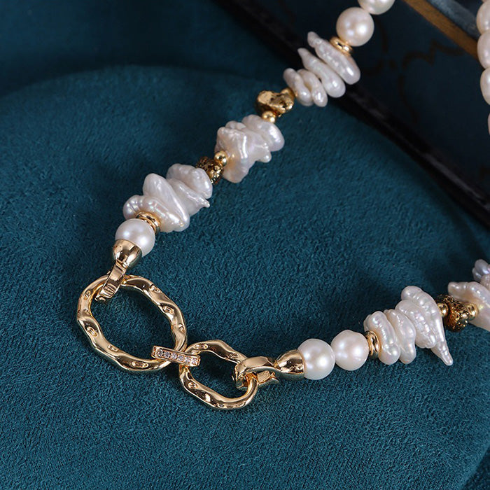 Close-up detail display of the clasp of Flat Keshi and Oval Pearl Strung Necklace