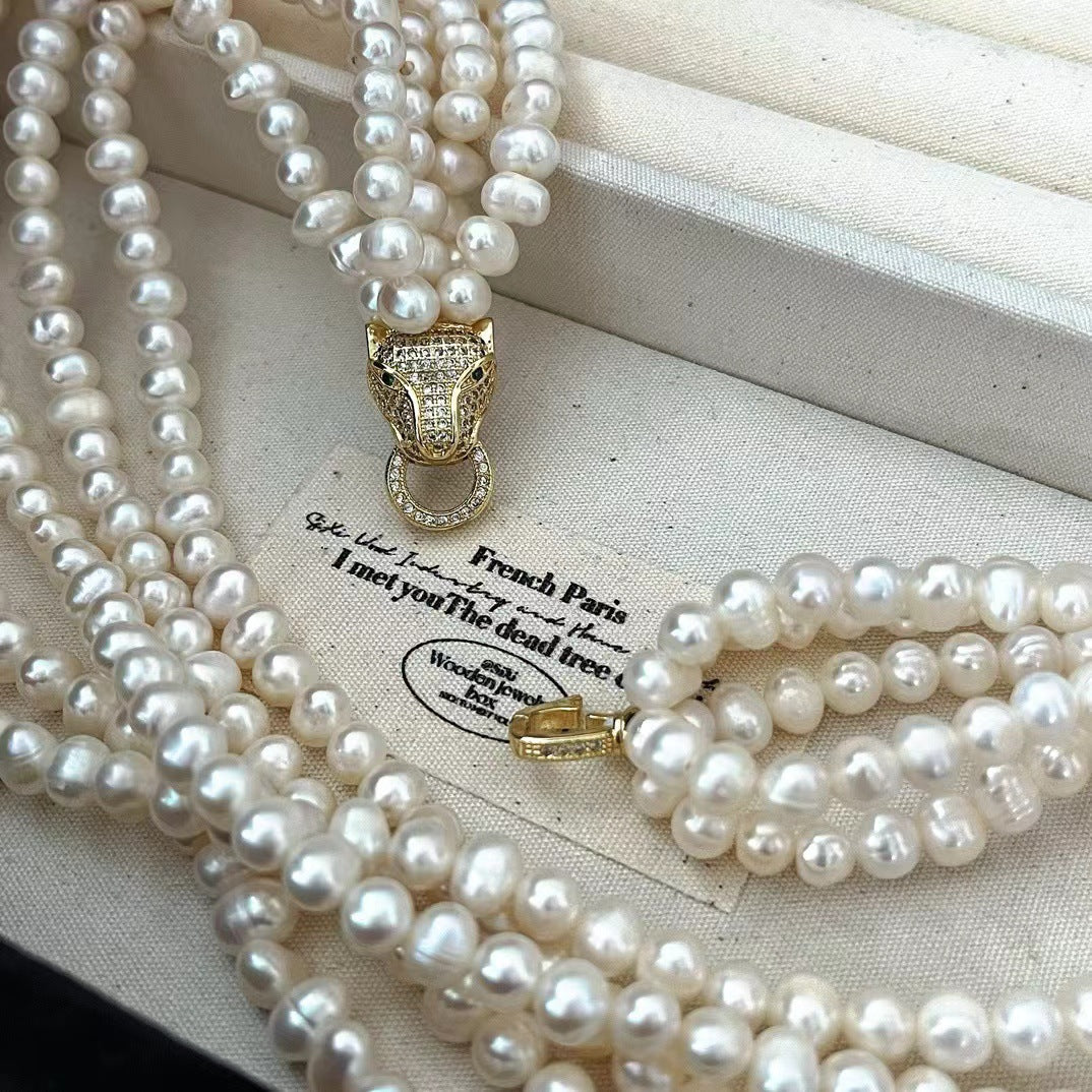 Eternal Grace – Multi-Strand Pearl Necklace