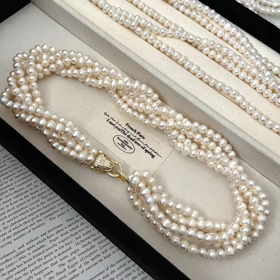 Eternal Grace – Multi-Strand Pearl Necklace