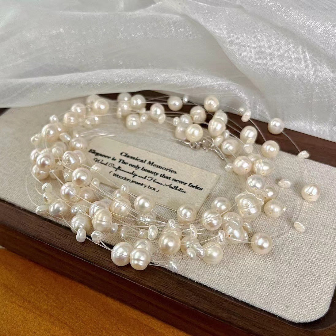 Stardust Veil - Multi-Strand Freshwater Pearl Necklace