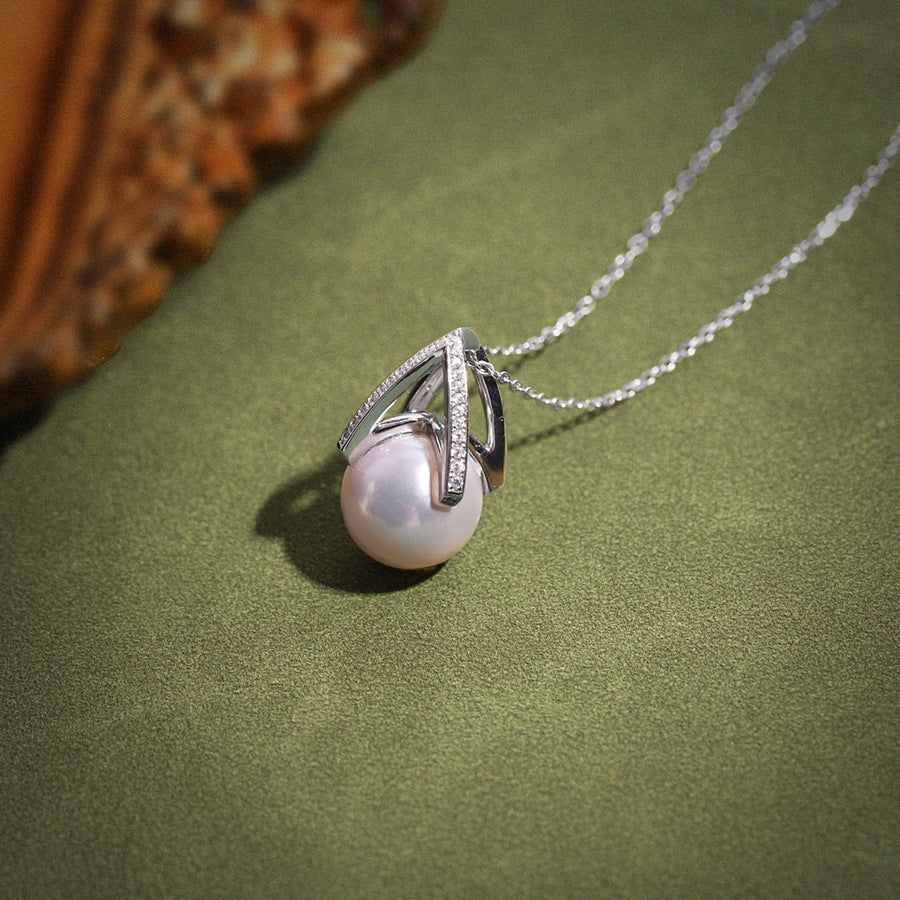 Framed Grace – Perfectly Round 11mm Pearl Earrings